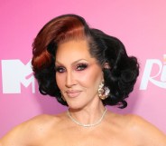 Michelle Visage headshot against pink background