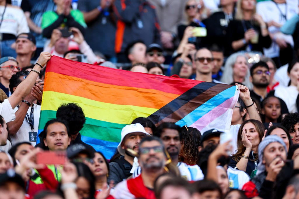ans hoisting a rainbow flag during the 2026 FIFA World Cup Group G match between Egypt and IR Iran at Seattle Stadium