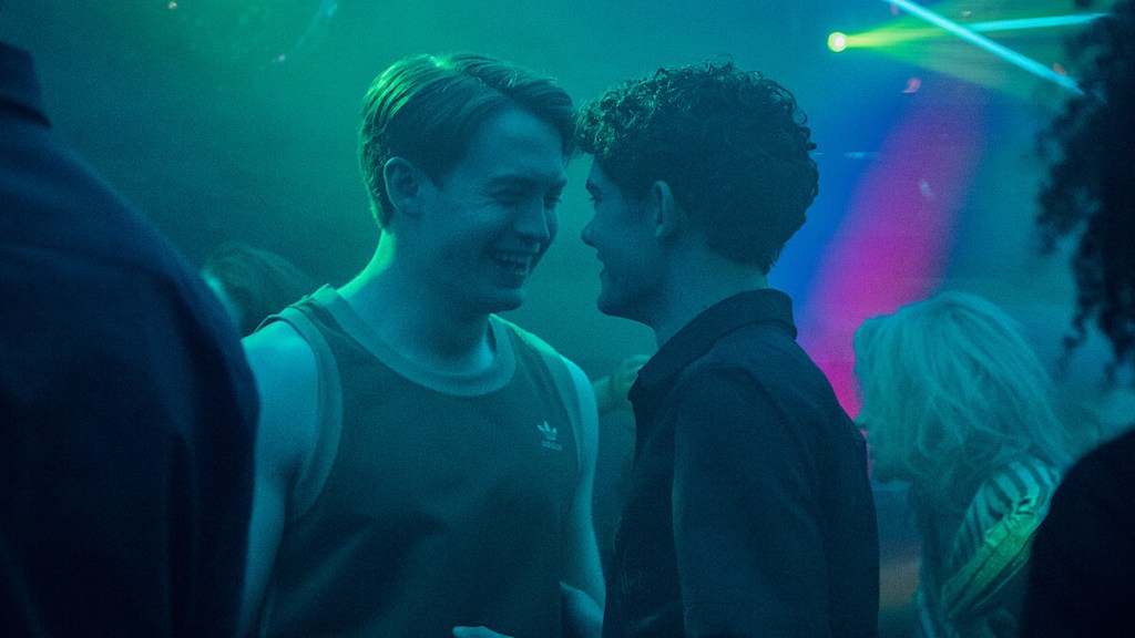 still from Heartstopper Forever: Nick and Charlie in a club