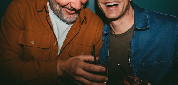 two men laughing