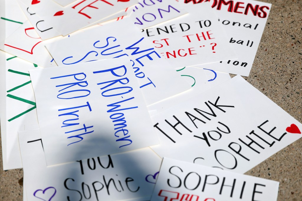 Signs supporting Sophie Cunningham of the Indiana Fever seen prior to the start of a game against the Minnesota.
