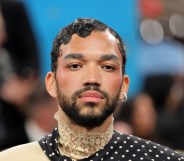 Justice Smith posing at the Met Gala