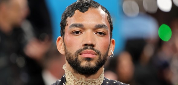 Justice Smith posing at the Met Gala