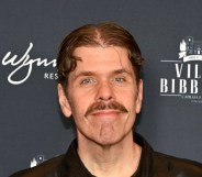 Perez Hilton against black background