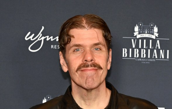 Perez Hilton against black background