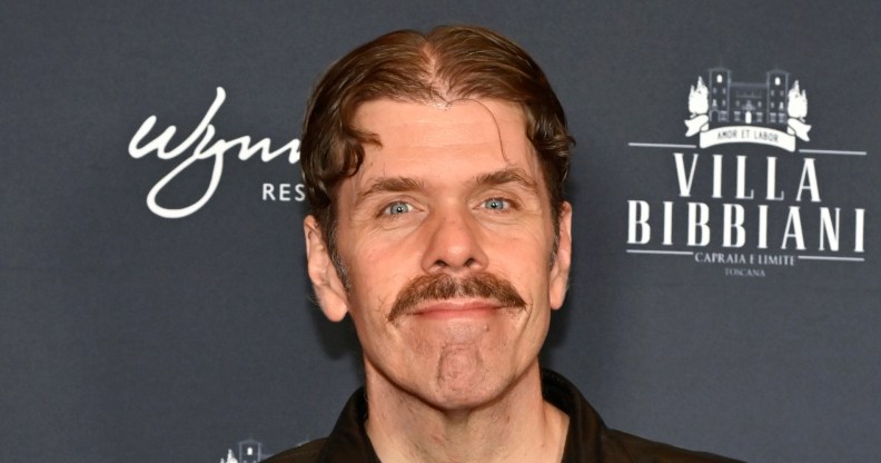 Perez Hilton against black background