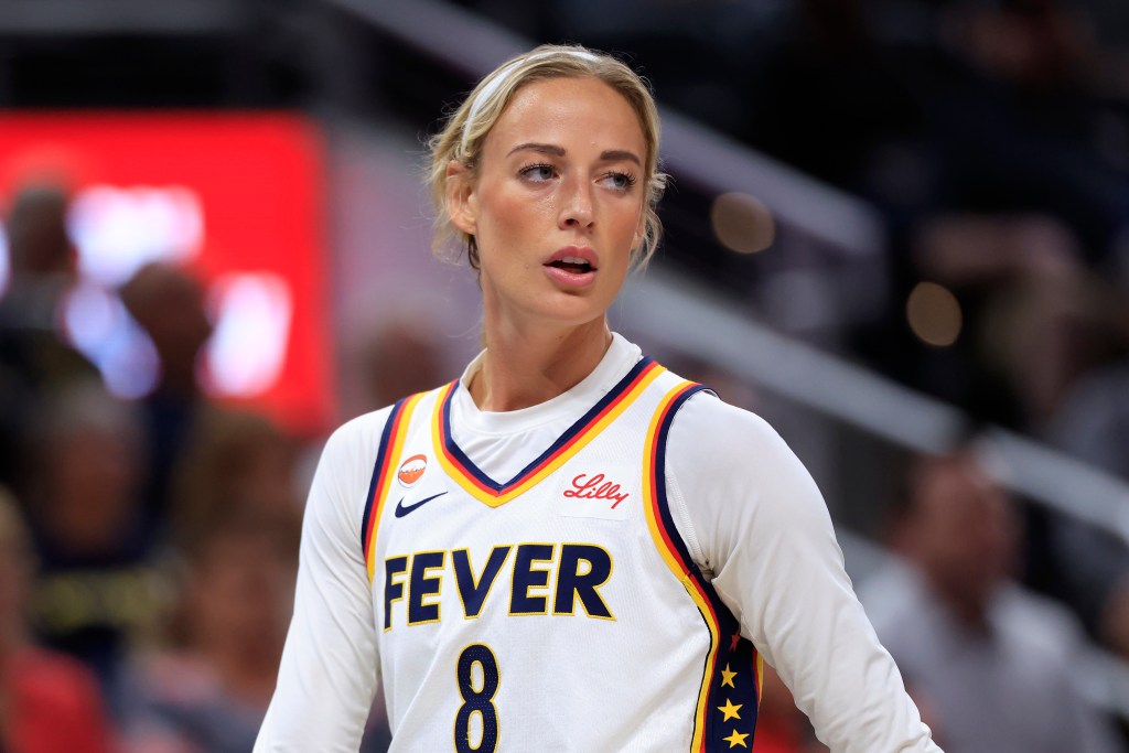 Sophie Cunningham in a fever vest on the basketball court