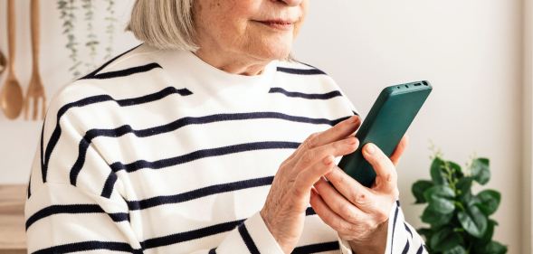 older woman using phone