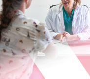 a woman speaks with a doctor