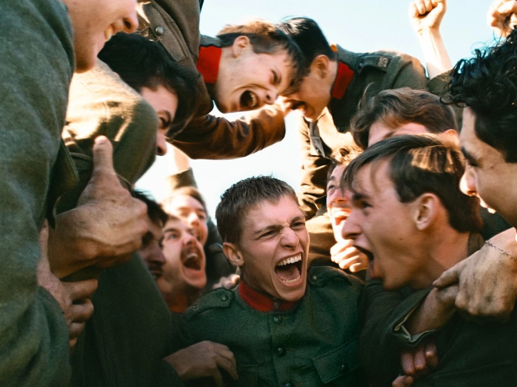 Coward: army soldiers cheering in a huddle
