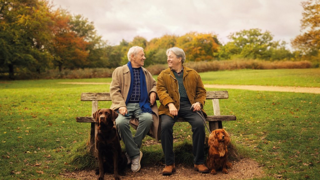 Frank and Percy: Ian McKellen and Roger Allam sat on a park bench.