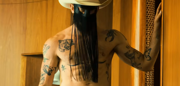 Country star Orville Peck in the new issue of Playgirl. (Playgirl)