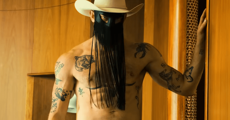 Country star Orville Peck in the new issue of Playgirl. (Playgirl)