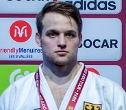 BERCY, FRANCE, 5 FEBRUARY: Triple German national champion, Timo Cavelius, 26, wearing his u81kg (light-middleweight) silver medal and showing his prize money cheque during day 2 of the 2023 Paris Judo Grand Slam (4-5 February) at the Accorhotels Arena in Bercy, Paris, France. (Photo by David Finch/Getty Images)