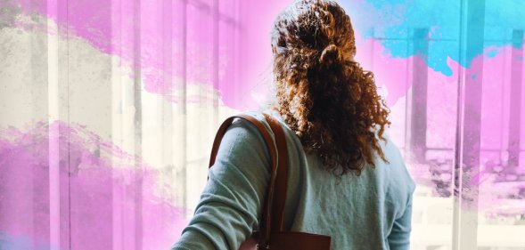 A teacher entering a classroom, with an edited trans gradient.
