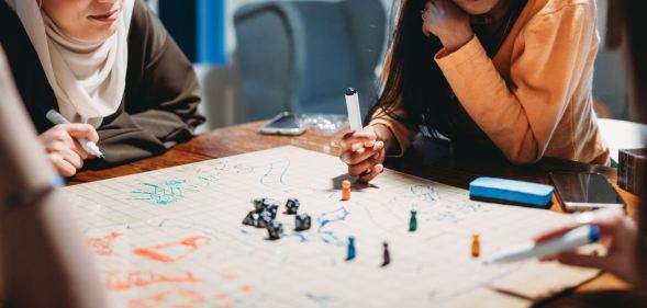 A group of women playing Dungeons & Dragons