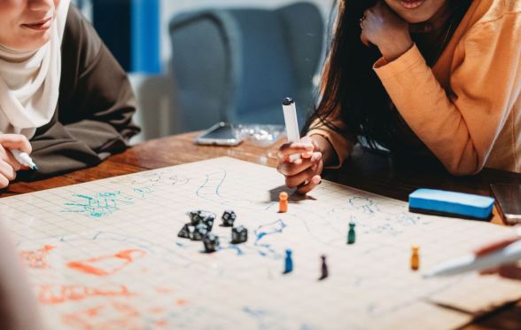 A group of women playing Dungeons & Dragons