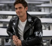 Antoni Porowski wearing the leather jacket designed by James Concannon on "Queer Eye" season four.