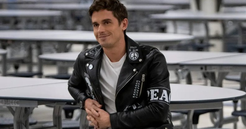 Antoni Porowski wearing the leather jacket designed by James Concannon on "Queer Eye" season four.