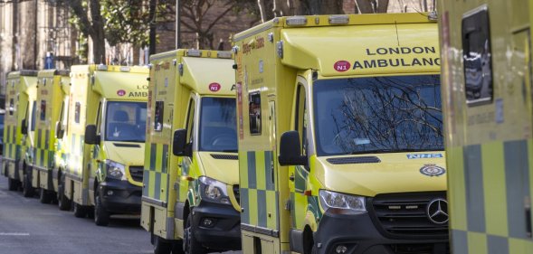 Several ambulances driving through London.