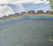 Totnes Castle wrapped in a giant Pride flag
