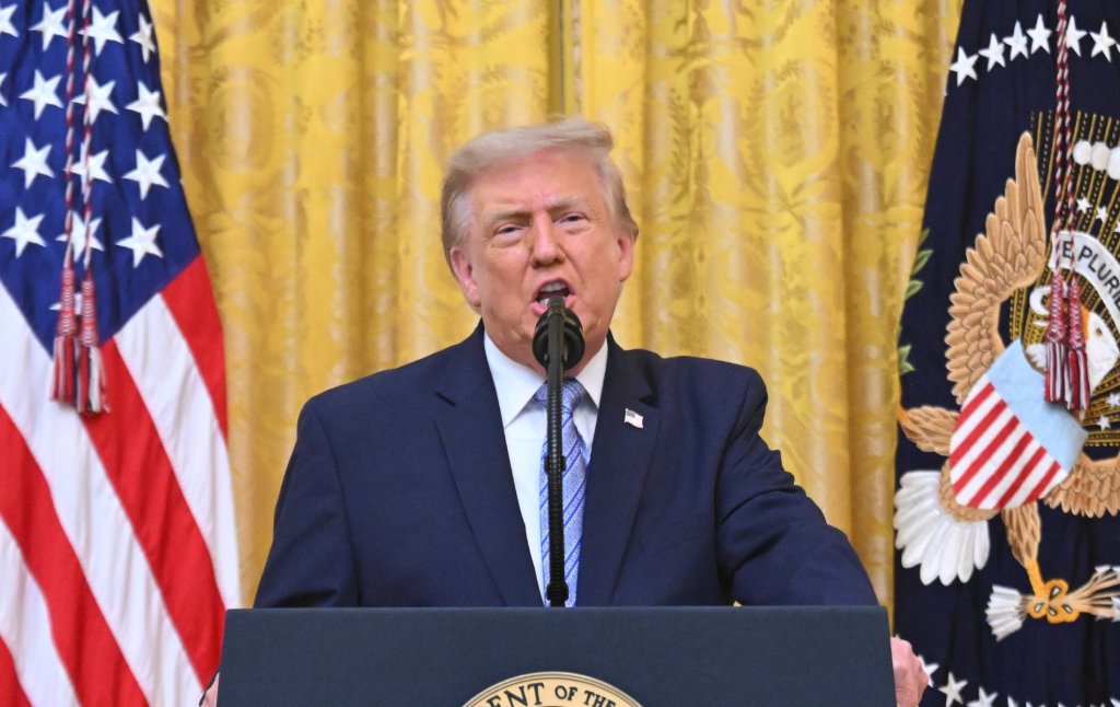 U.S. President Donald Trump addresses the nation from the East Room of the White House