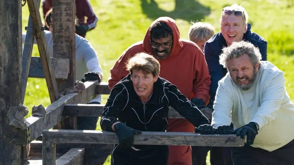 The Celebrity Traitors battering ram task.