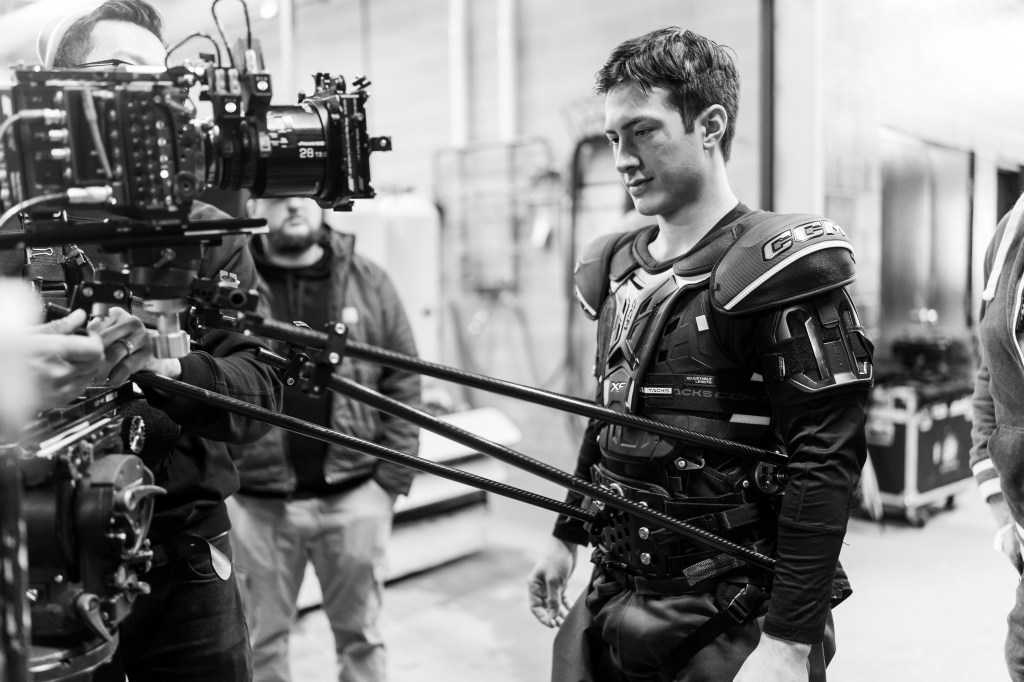 Heated Rivalry - Hudson Williams as Shane Hollander in Episode 105 BTS of Heated Rivalry.