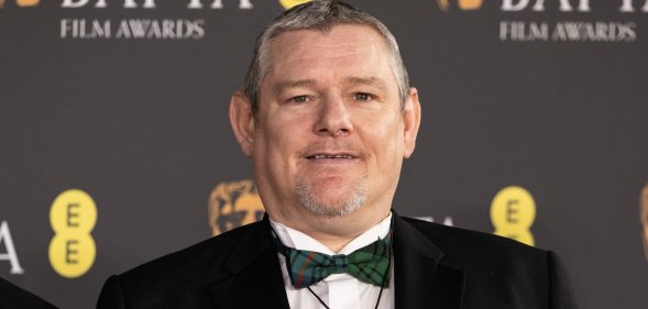 John Davidson at the 2026 BAFTAs