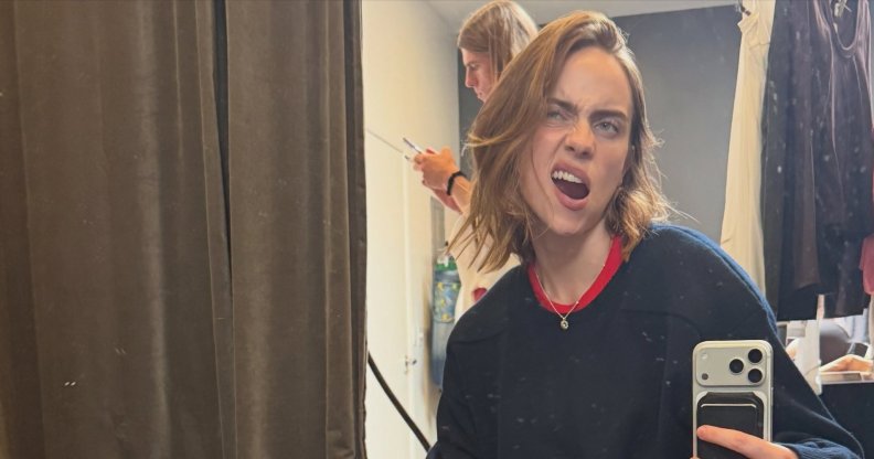 Billie Eilish in a mirror selfie.