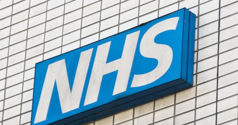 A skewed shot of an NHS sign.