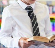 A school student reading a book