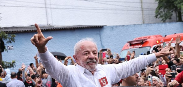 SAO PAULO, BRAZIL - OCTOBER 25: Luiz Inácio Lula Da Silva, incumbent president of Brazil and presidential candidate waves supporters after casting his vote during general election day on October 25, 2
