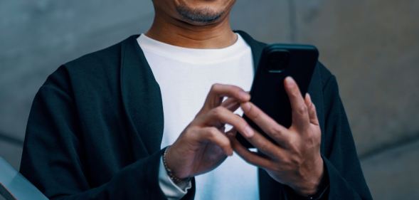 A man using a mobile phone