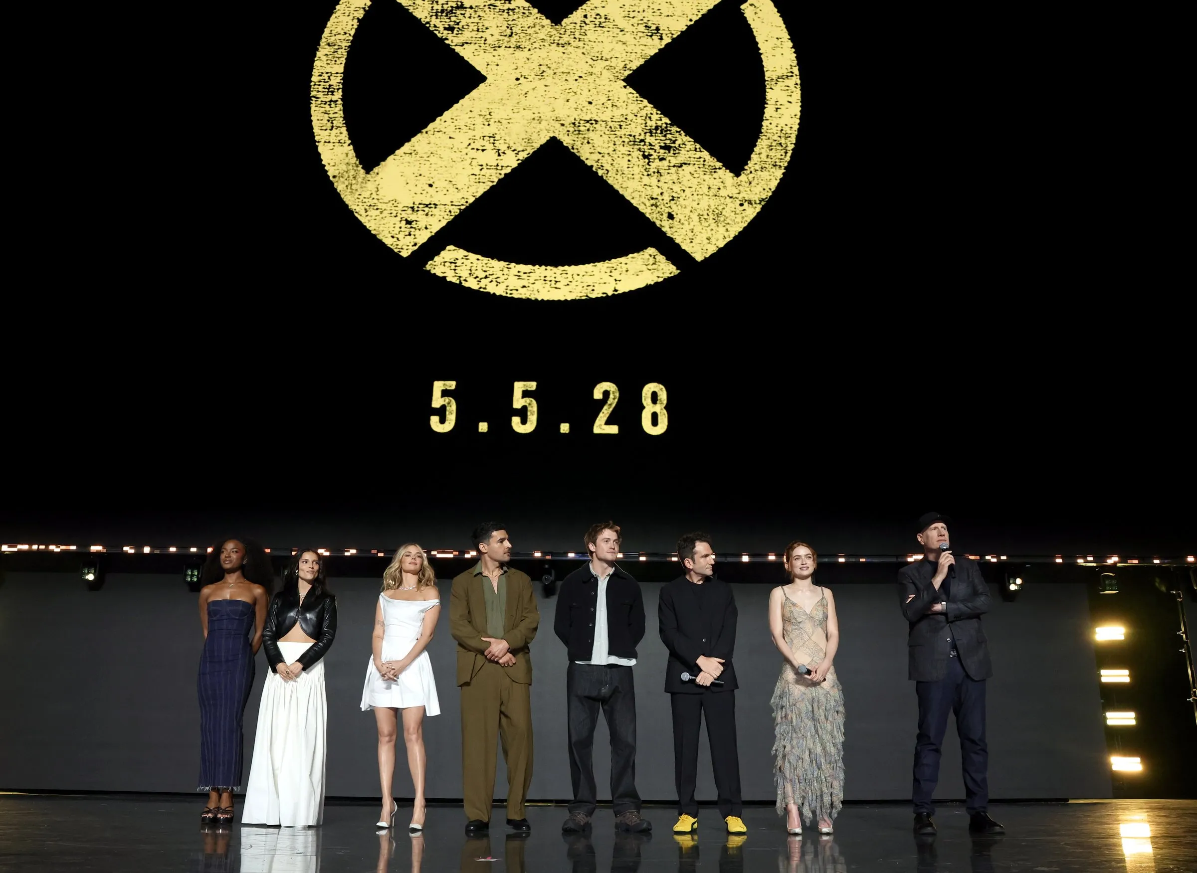 (L-R) Maya Boyd, Inde Navarrette, Samara Weaving, Christopher Abbott, Kit Connor, Jake Schreier, Sadie Sink and Kevin Feige, President, Marvel Studios, speak onstage