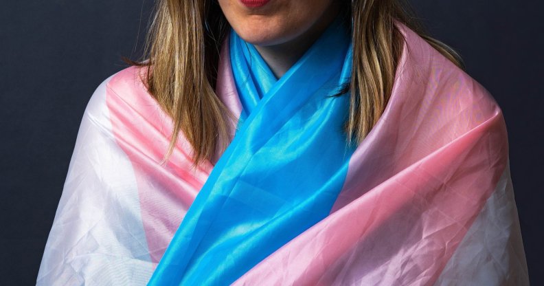 Person wearing a trans Pride flag