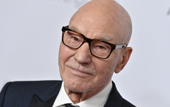 Sir Patrick Stewart wearing glasses and a dark suit at the American Cinematheque Awards