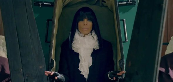 Claudia Winkleman in a coffin