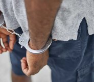 Person in Handcuffs Wearing Gray T-Shirt